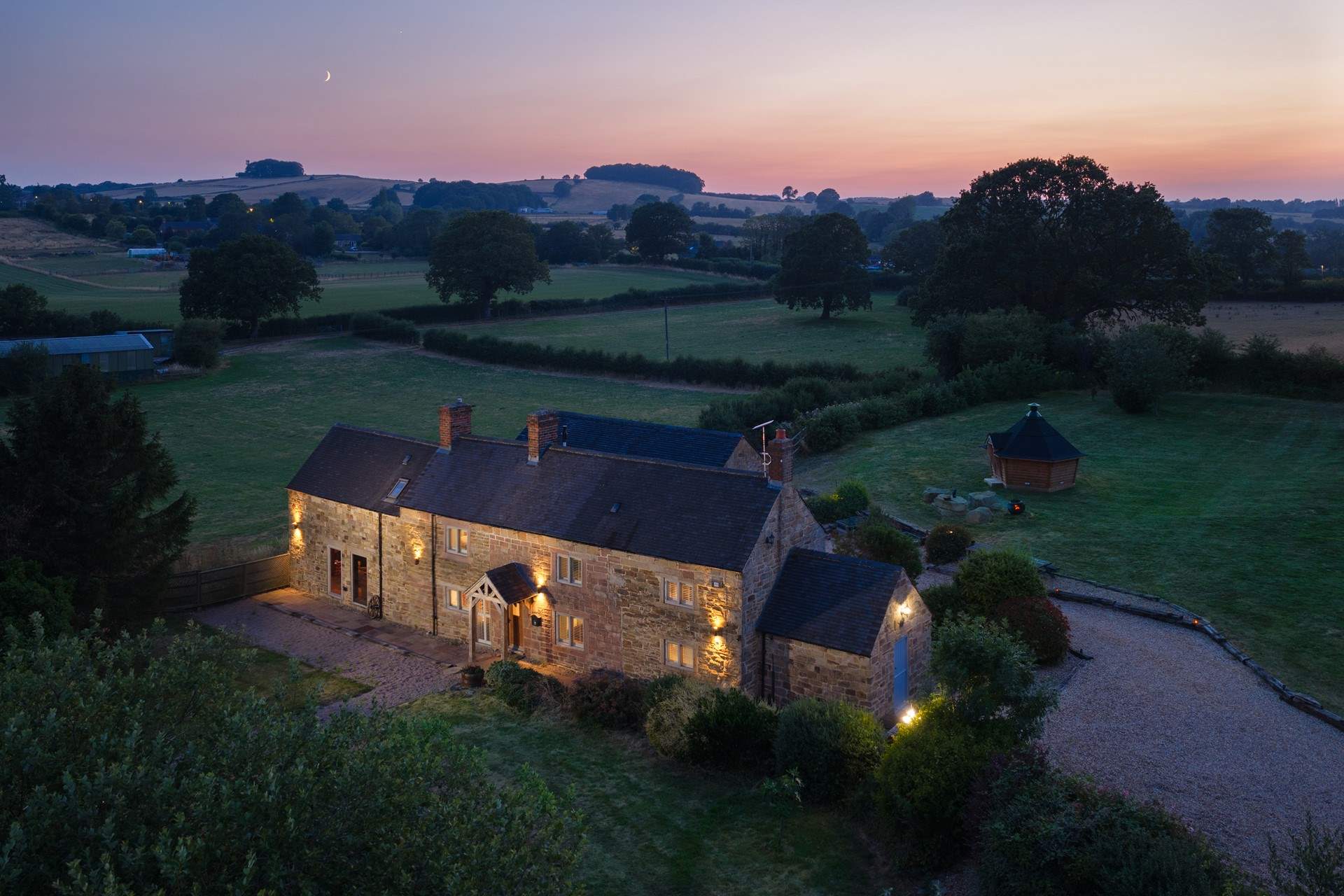 In the evening the house lights up.