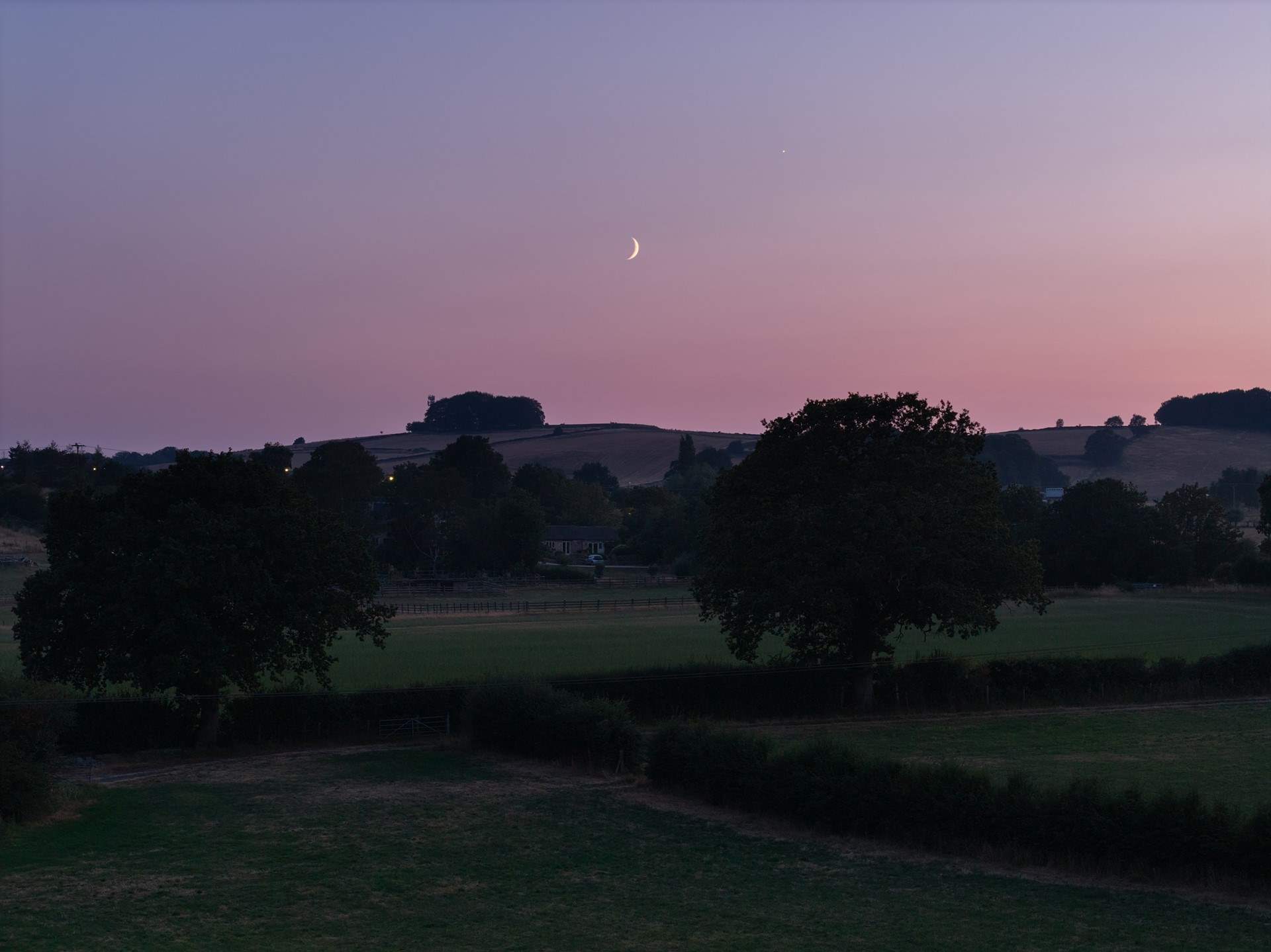 Watch the sun go down over the hills from the garden.