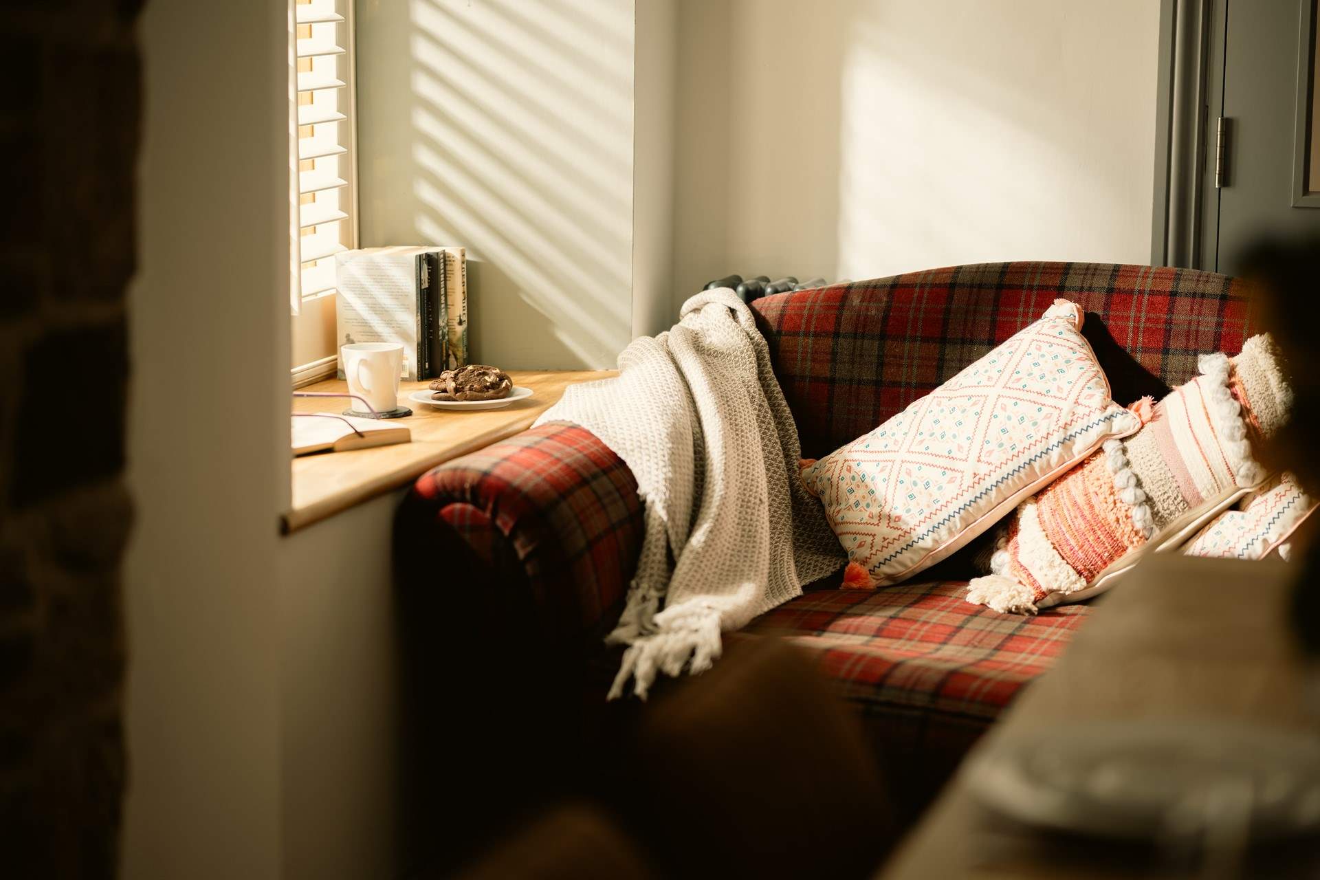 This cosy corner makes a perfect quiet reading nook.