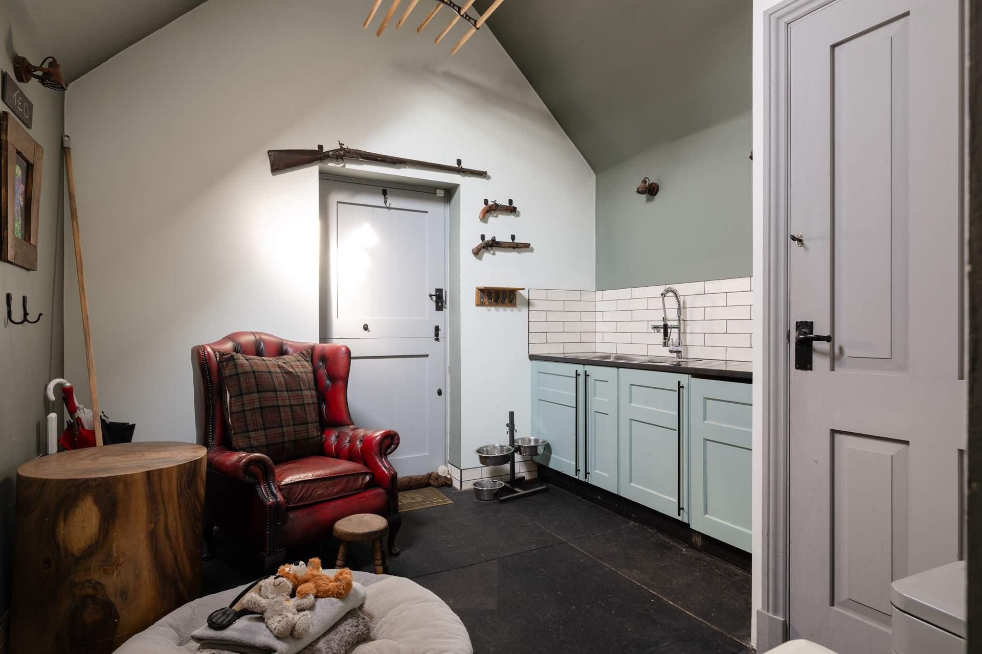 A useful utility-room with beds for dogs and an old fashioned clothes airer for those damp days in the Peaks.