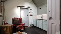 A useful utility-room with beds for dogs and an old fashioned clothes airer for those damp days in the Peaks.