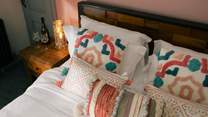 The colourful cushions add style and comfort.
