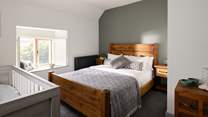 Bedroom two has a cot already set up for you.