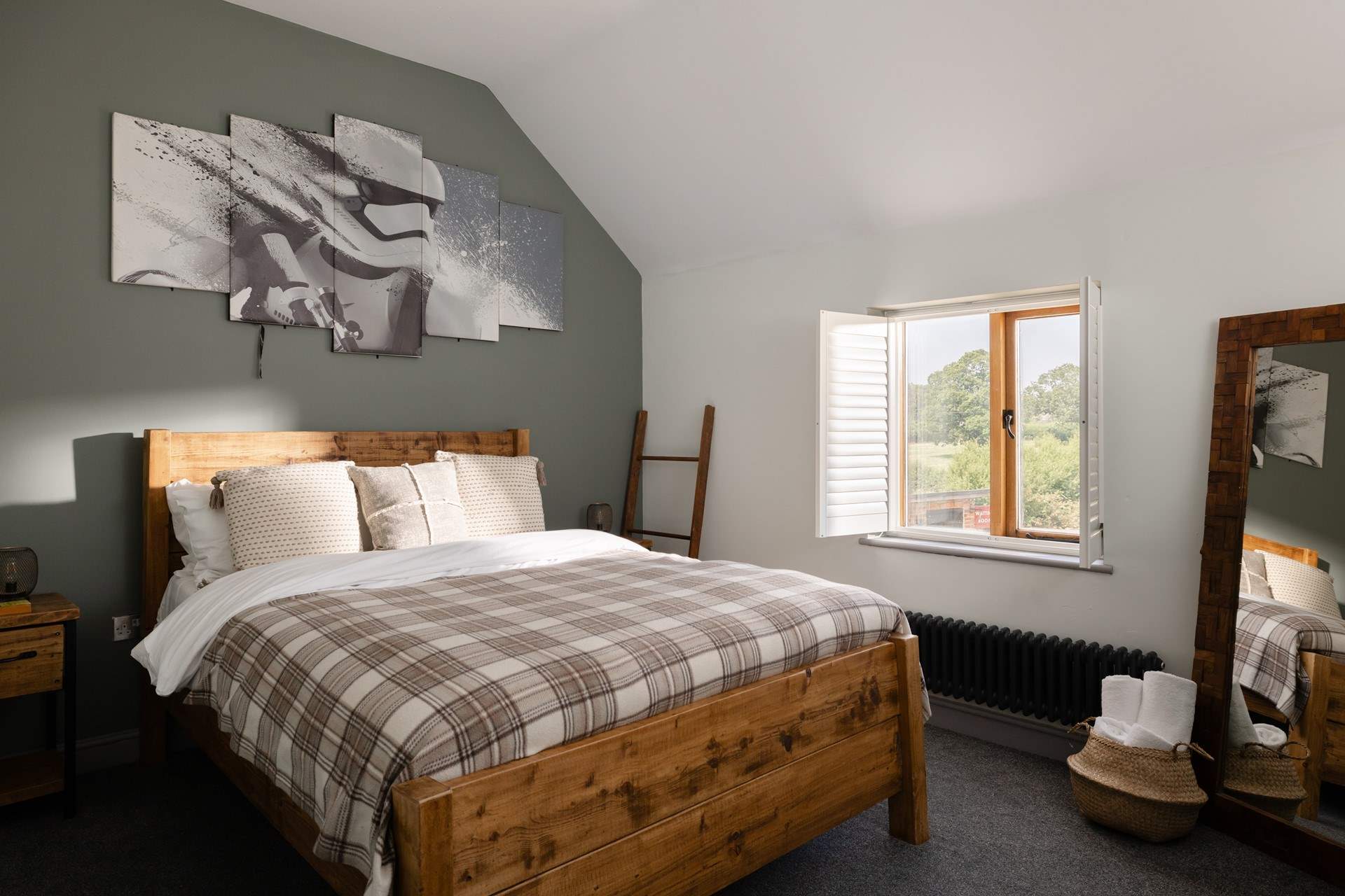 Bedroom three looks out over the spacious lawned area.