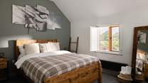 Bedroom three looks out over the spacious lawned area.