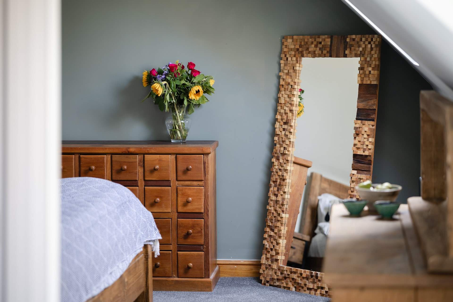 The full length mirror reflects the room and is great for those last minute clothing adjustments.