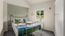 Bedroom 1 is home to this super comfy king-size bed and fabulous countryside views.