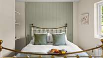 Bedroom 1 is super cosy, perfect for a restful night's sleep.
