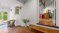 Step down from the living area into the newly created part of the property.