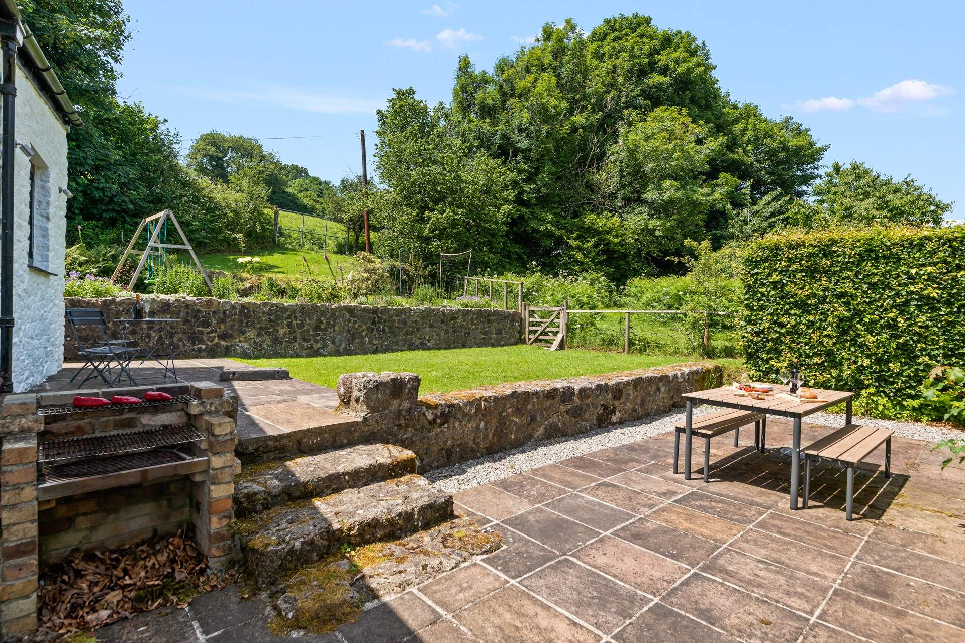 Whether is be barbecuing, swinging or simply relaxing, this beautiful space is perfect for all generations in the Dartmoor sun.