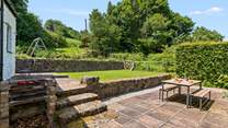 Whether it be barbecuing, swinging or simply relaxing, this beautiful space is perfect for all generations in the Dartmoor sun.