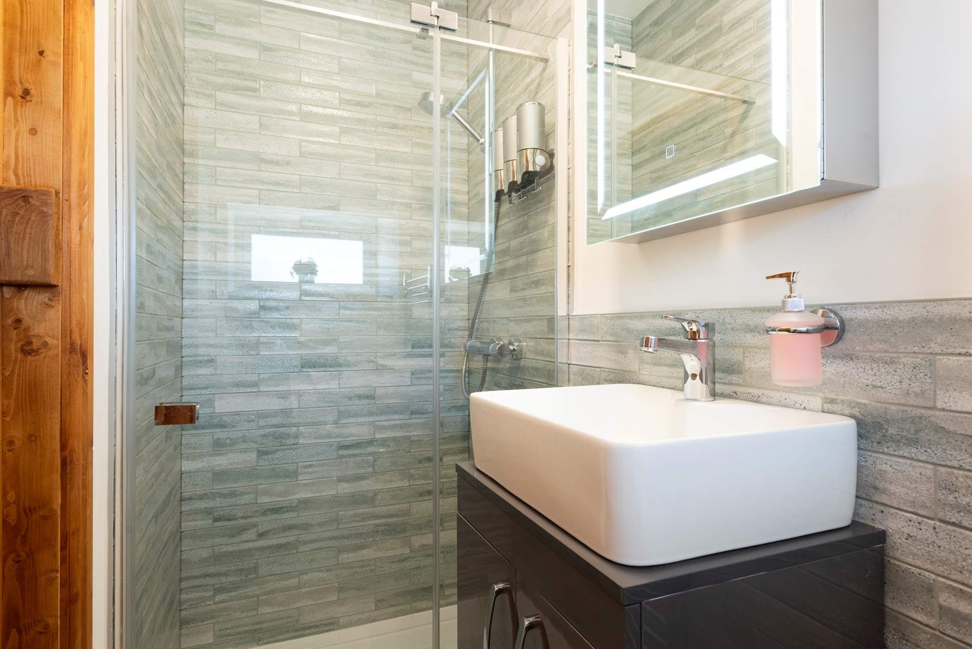 A stylish  shower-room with a contemporary finish.