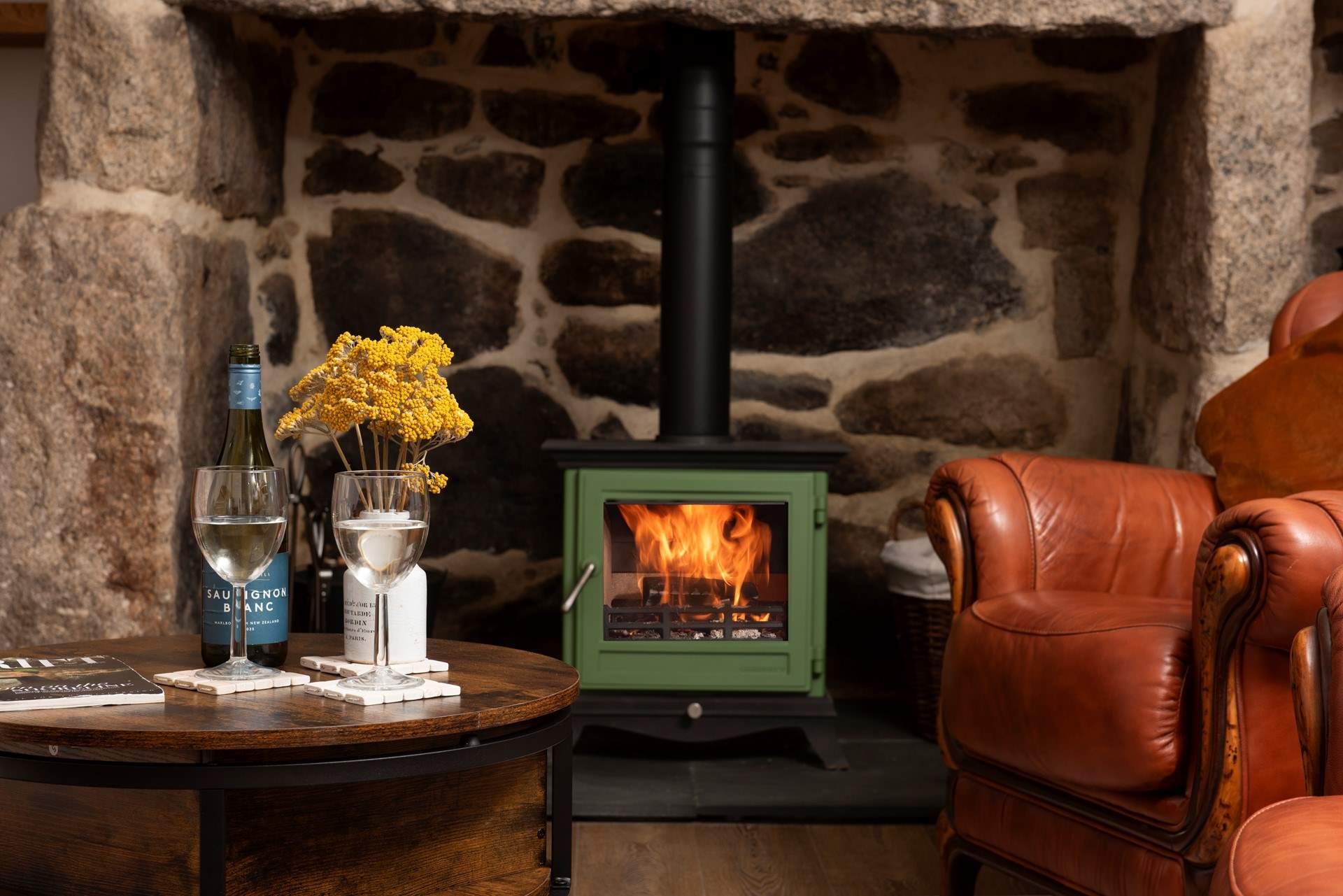 Unwind with a glass of wine by the fire on chillier evenings.