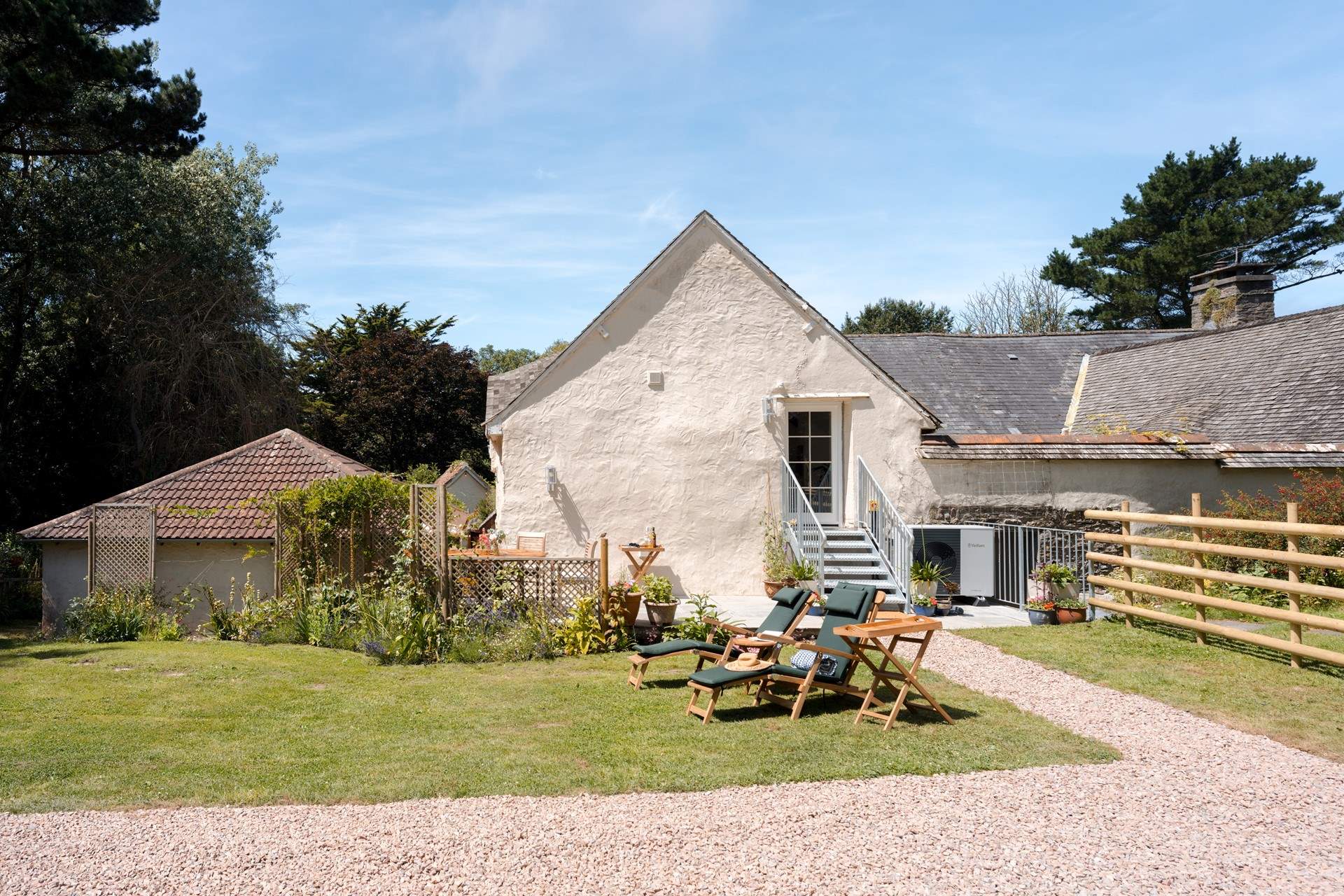 Head down the steps into your garden area. You're sure to see the owners' dog who loves to say hello.