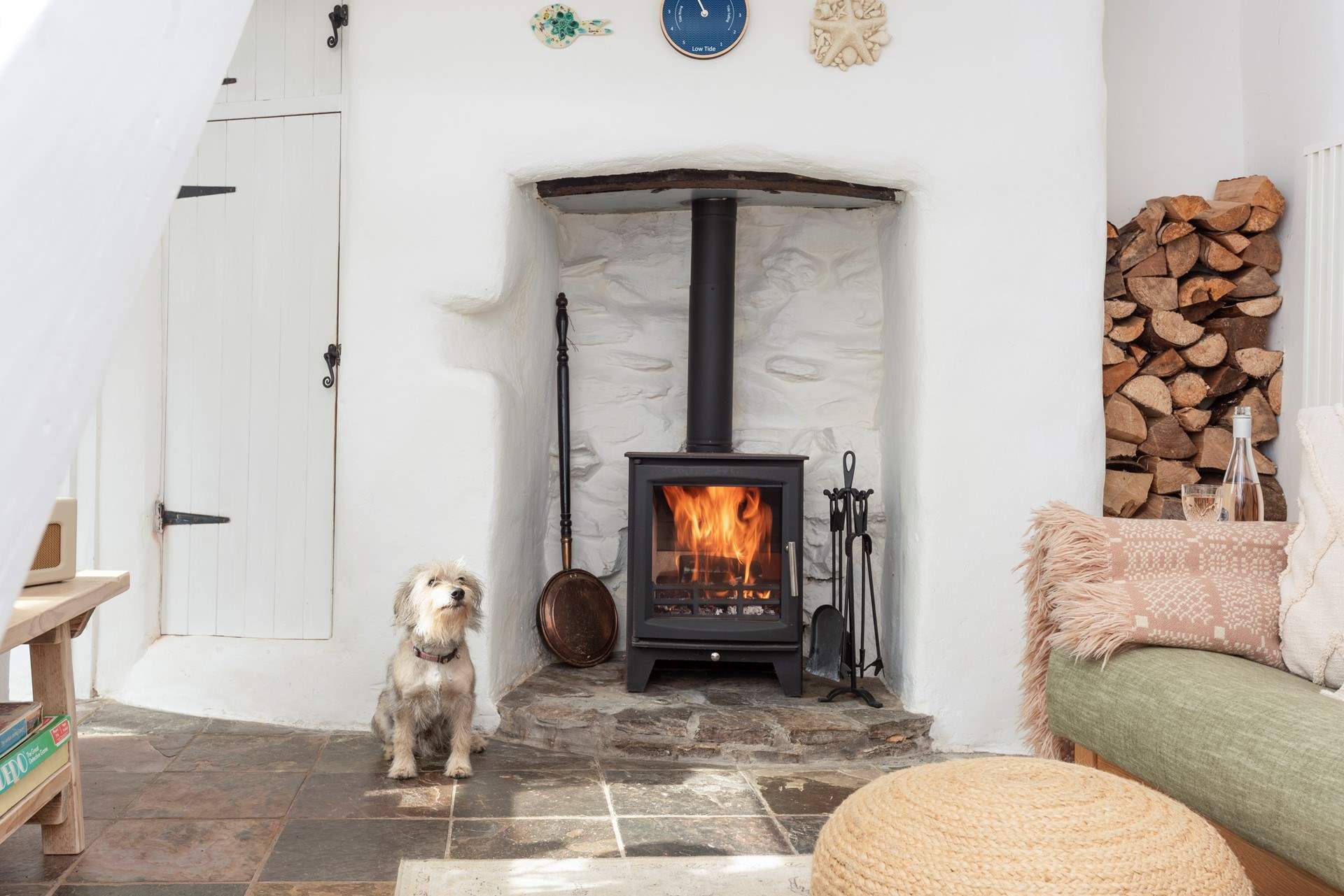 The perfect spot to snuggle in front of the fire with your pooch. 