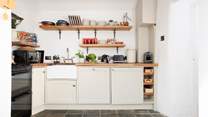 The modern farmhouse-style kitchen. 