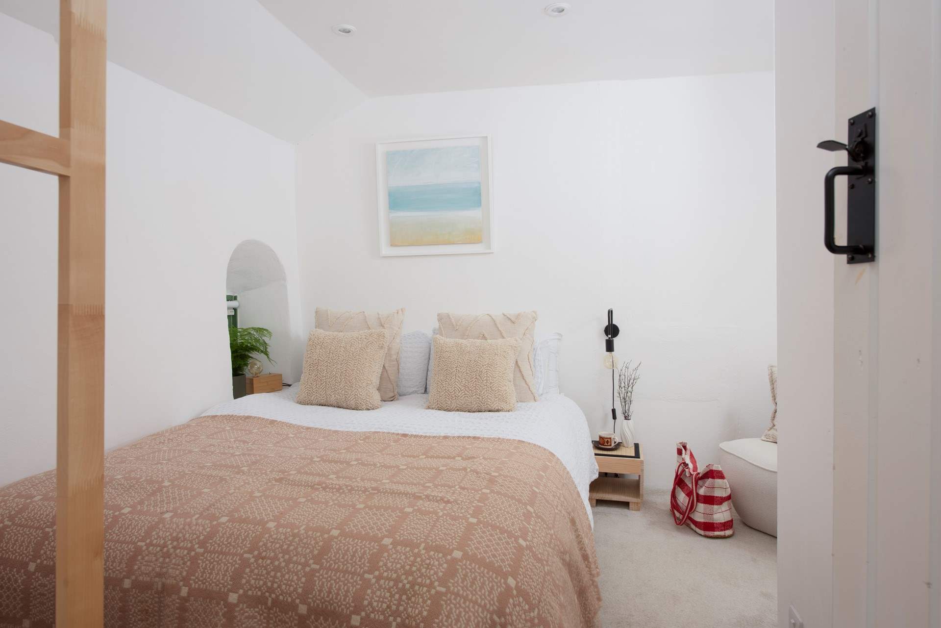 The relaxing bedroom has a king-size bed. 