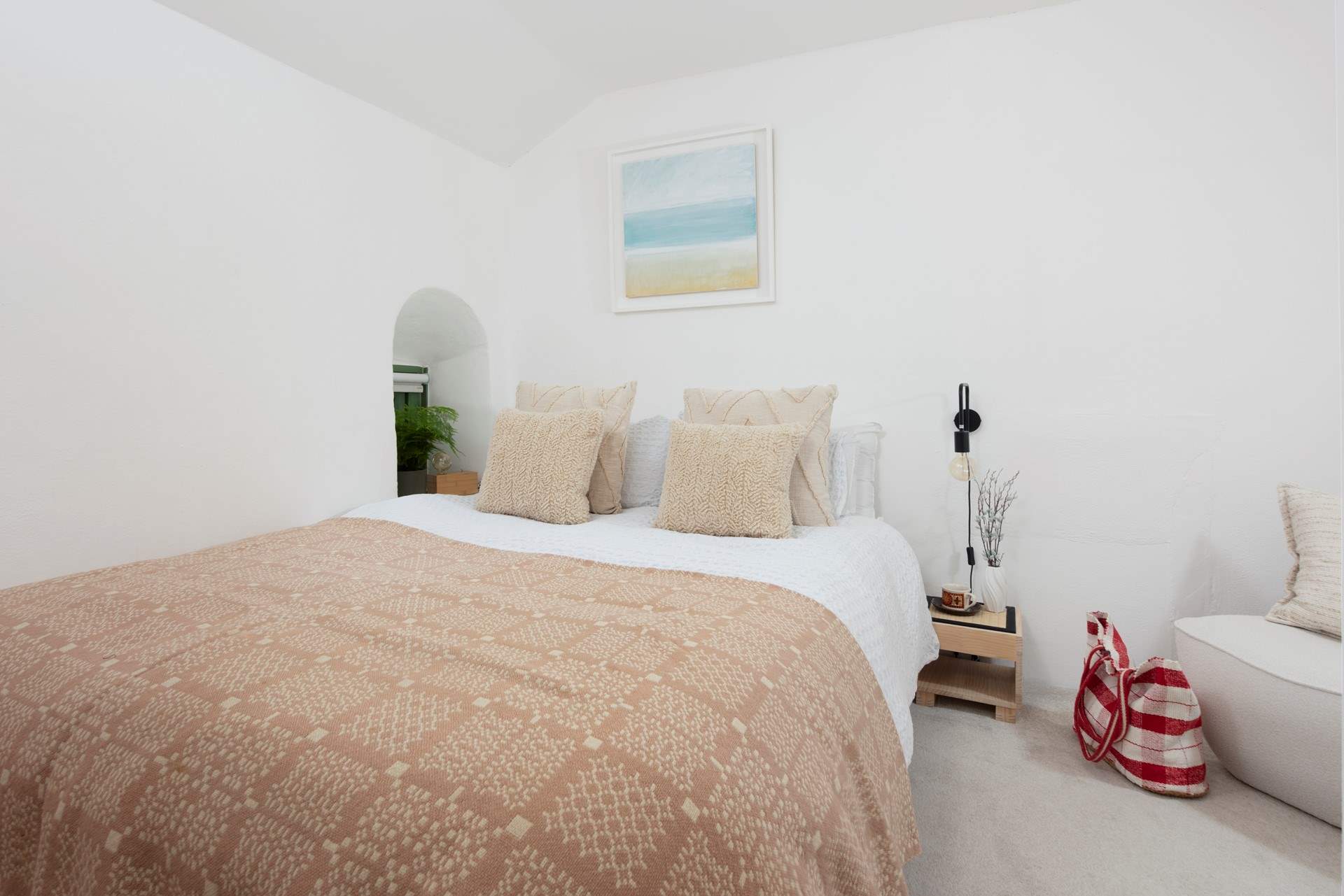 The relaxing bedroom has a king-size bed. 