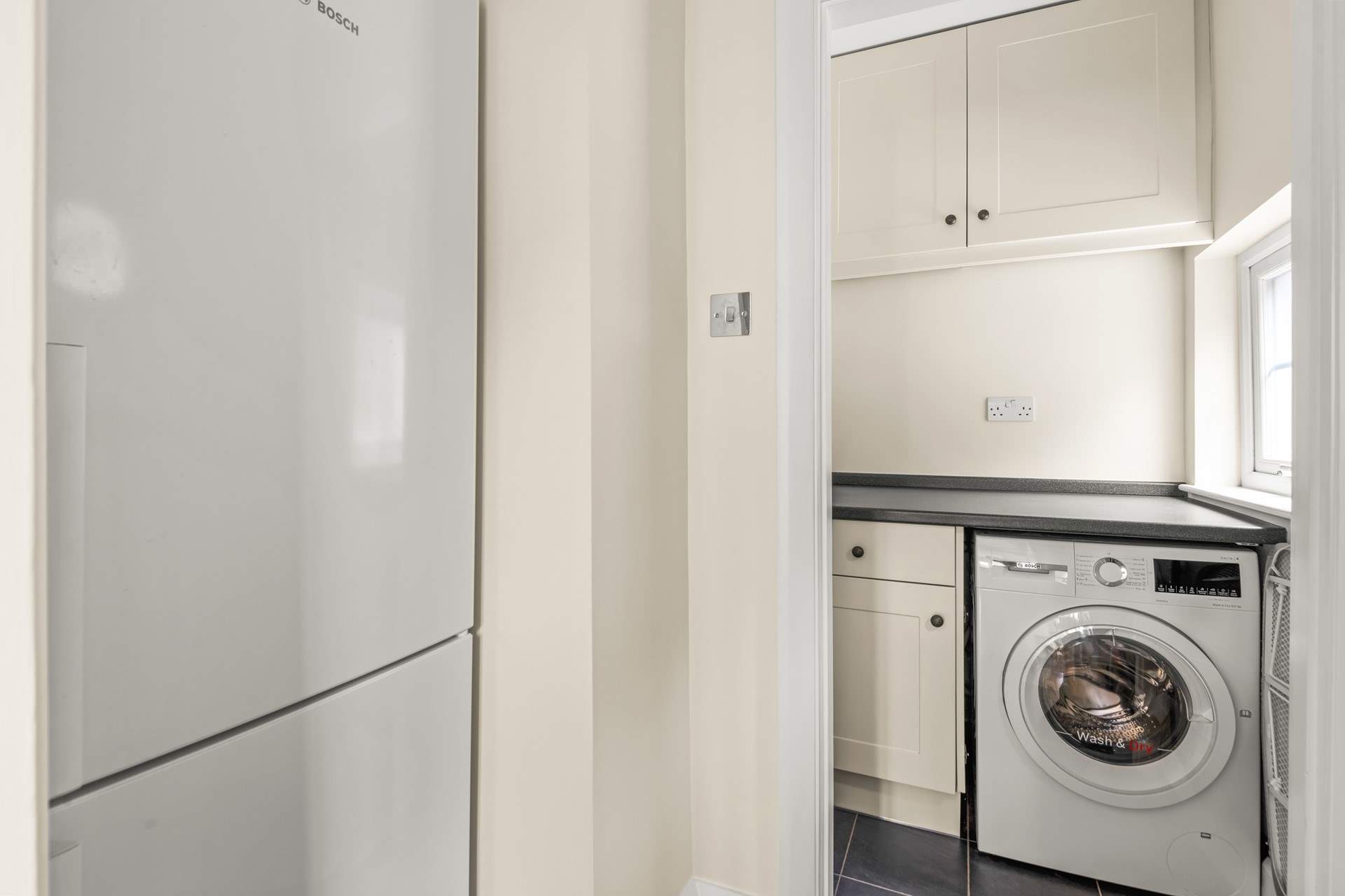 Just off the kitchen you have a very handy utility-room.