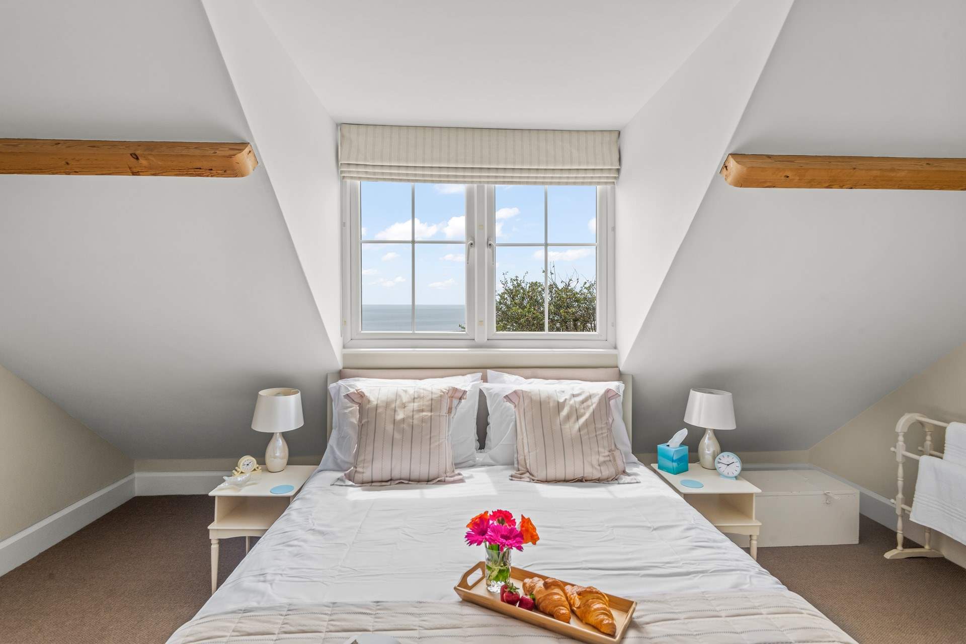 Bedroom 2 is home to a king-size bed, again with stunning sea views.