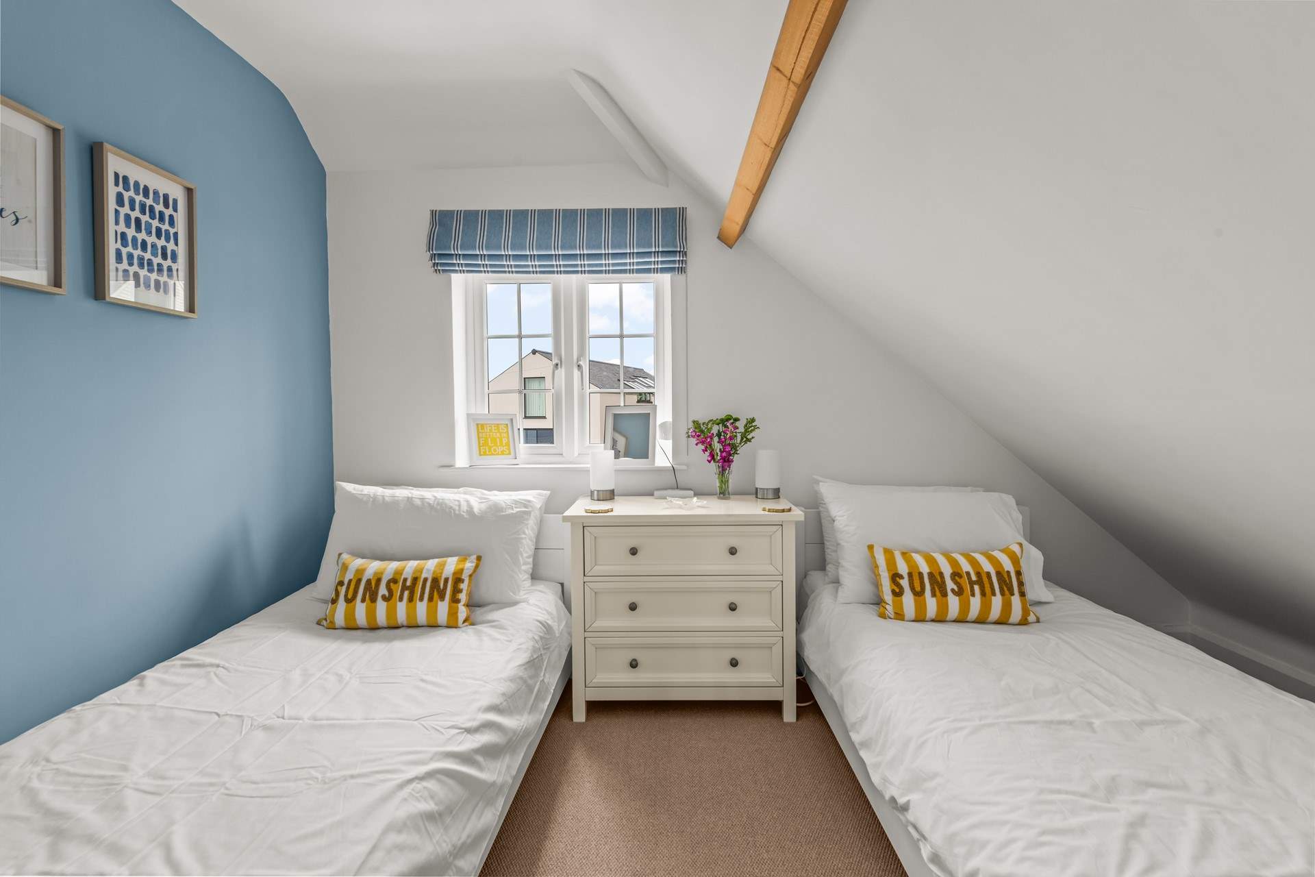 Bedroom 3 is such a cute twin room. Please mind your head on the sloping ceiling.