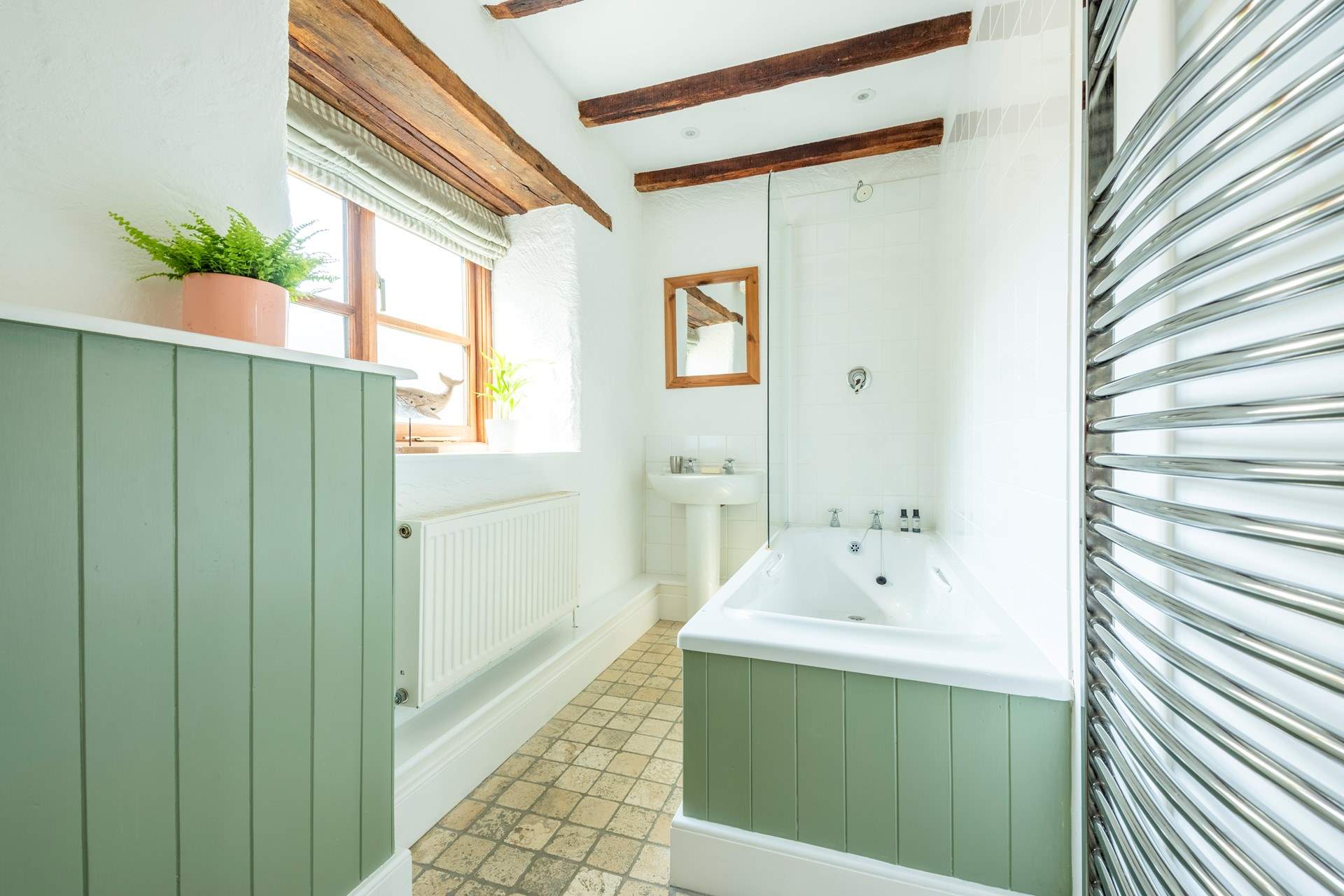 The family bathroom offers a bath for those long holiday soaks and a refreshing shower to wake you up in the morning.