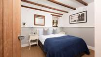 A double bed awaits in the second bedroom.