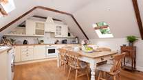 The kitchen/dining-room is sure to become the heart of the home.