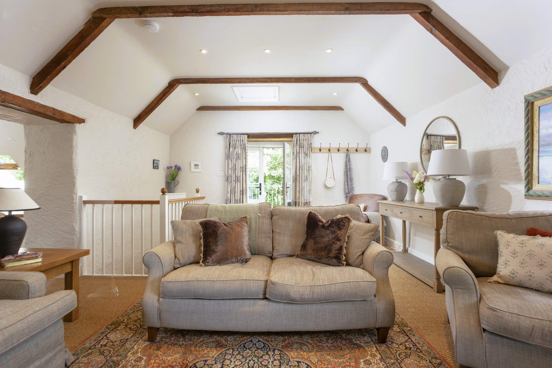 A warm welcome awaits in the sitting-room.