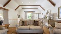 A warm welcome awaits in the sitting-room.