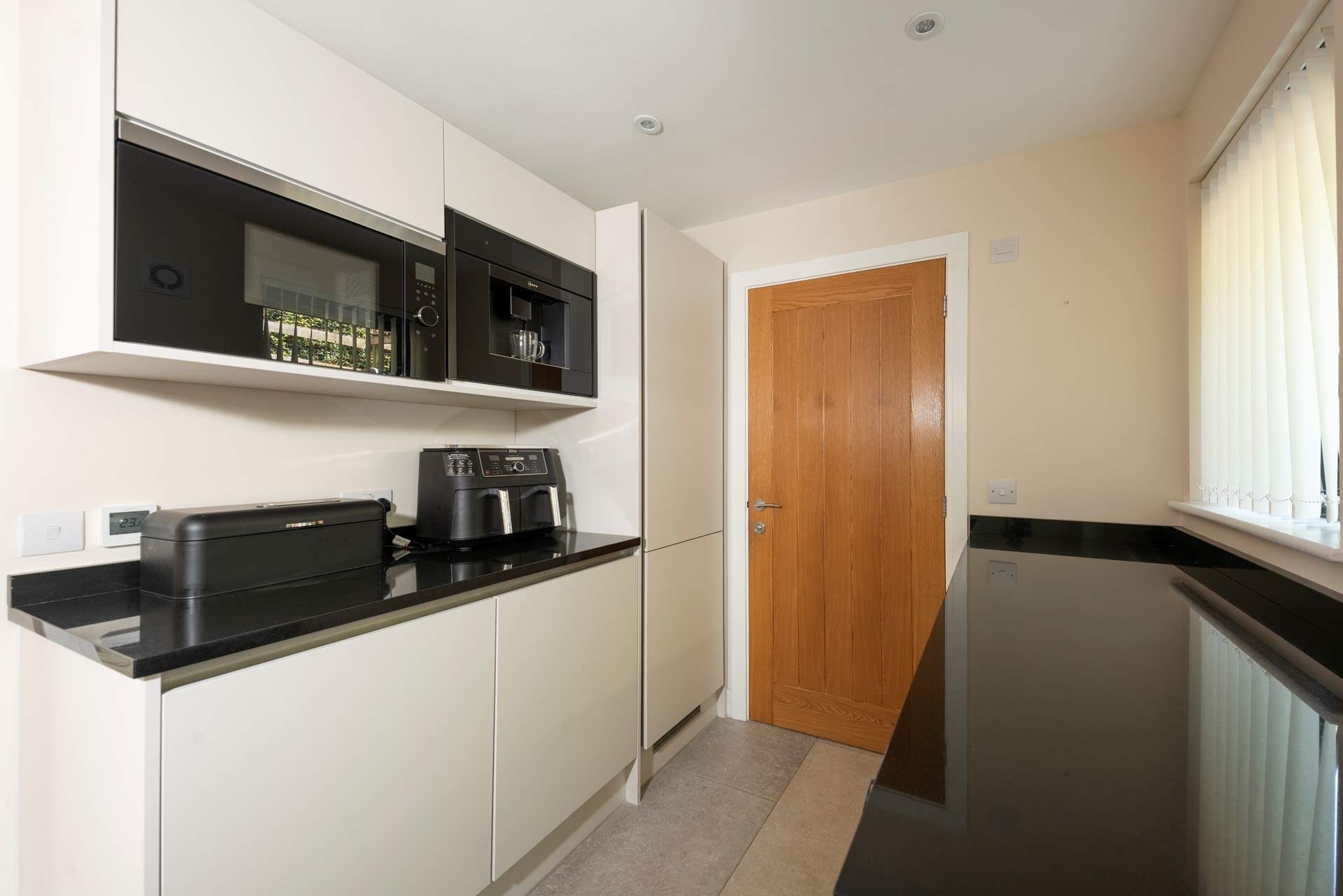 There is also a coffee machine, air fryer and microwave found here.