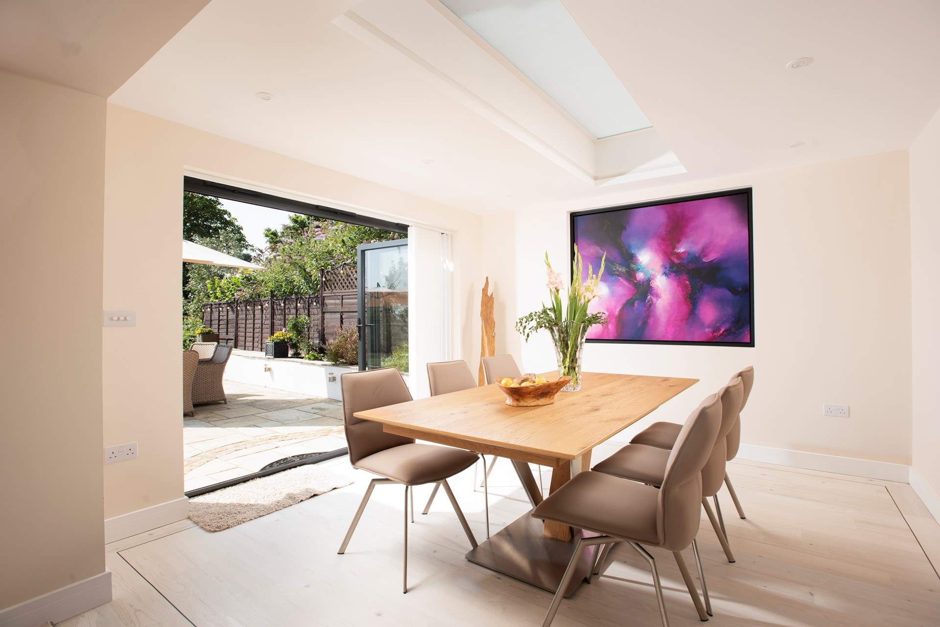 Open up the bi-fold doors to your dining-area.