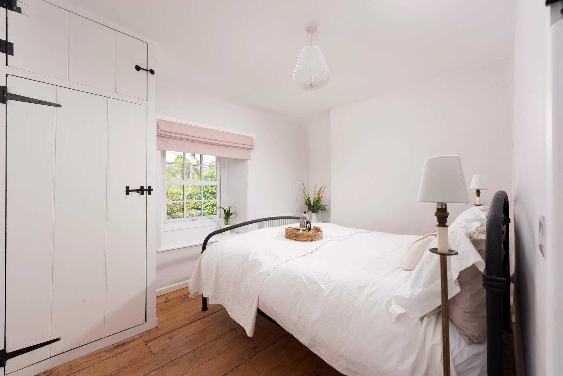 Listen to the waves lap the shore from the double bedroom.