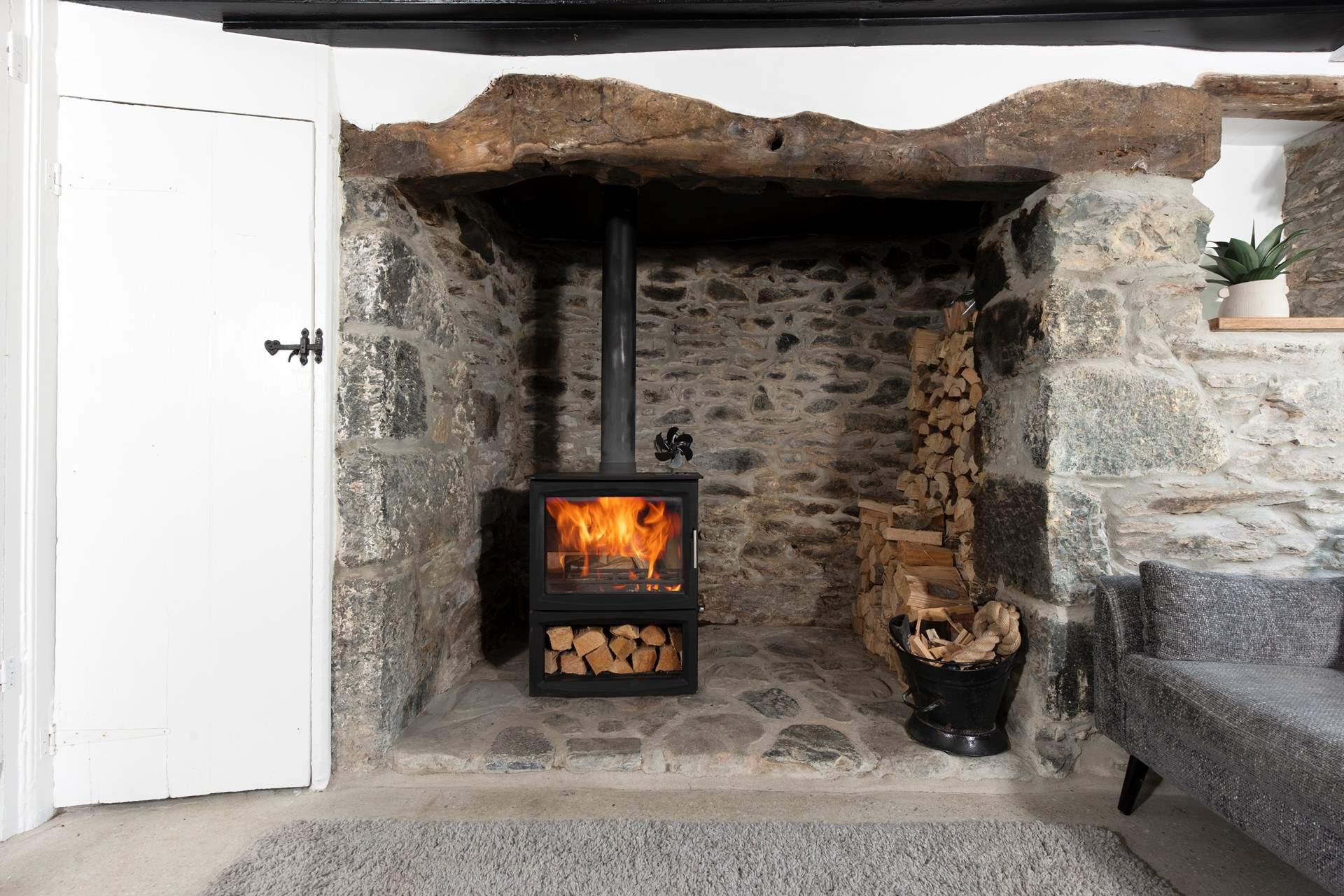 The stunning inglenook fireplace.