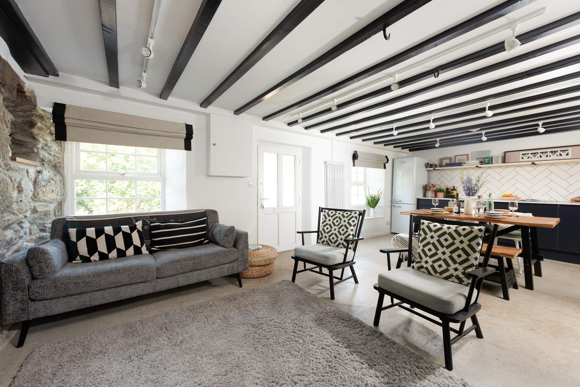 The hooks on the beams are original features.