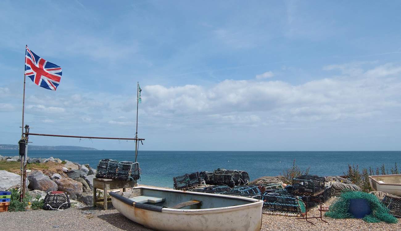 Boats and lobster pots on the beach at Beesands.