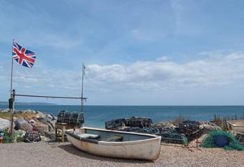 Boats and lobster pots on the beach at Beesands.