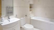 The sparkling white bathroom.