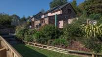 This gorgeous cottage offers a great enclosed space for your four-legged friends to run freely.