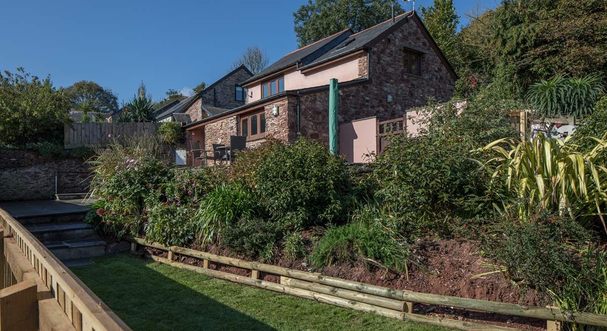 This gorgeous cottage offers a great enclosed space for your four-legged friend(s) to run freely.