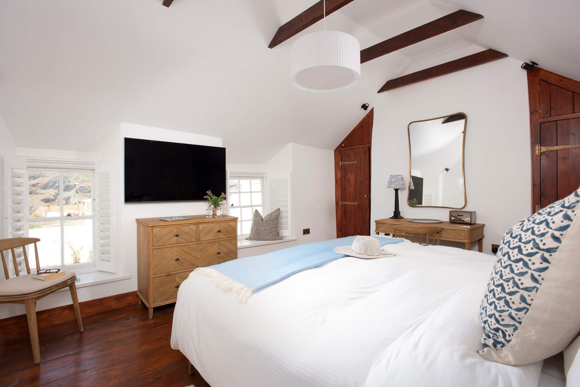 Snuggle under the covers in bedroom 1 to catch up on some holiday TV viewing.