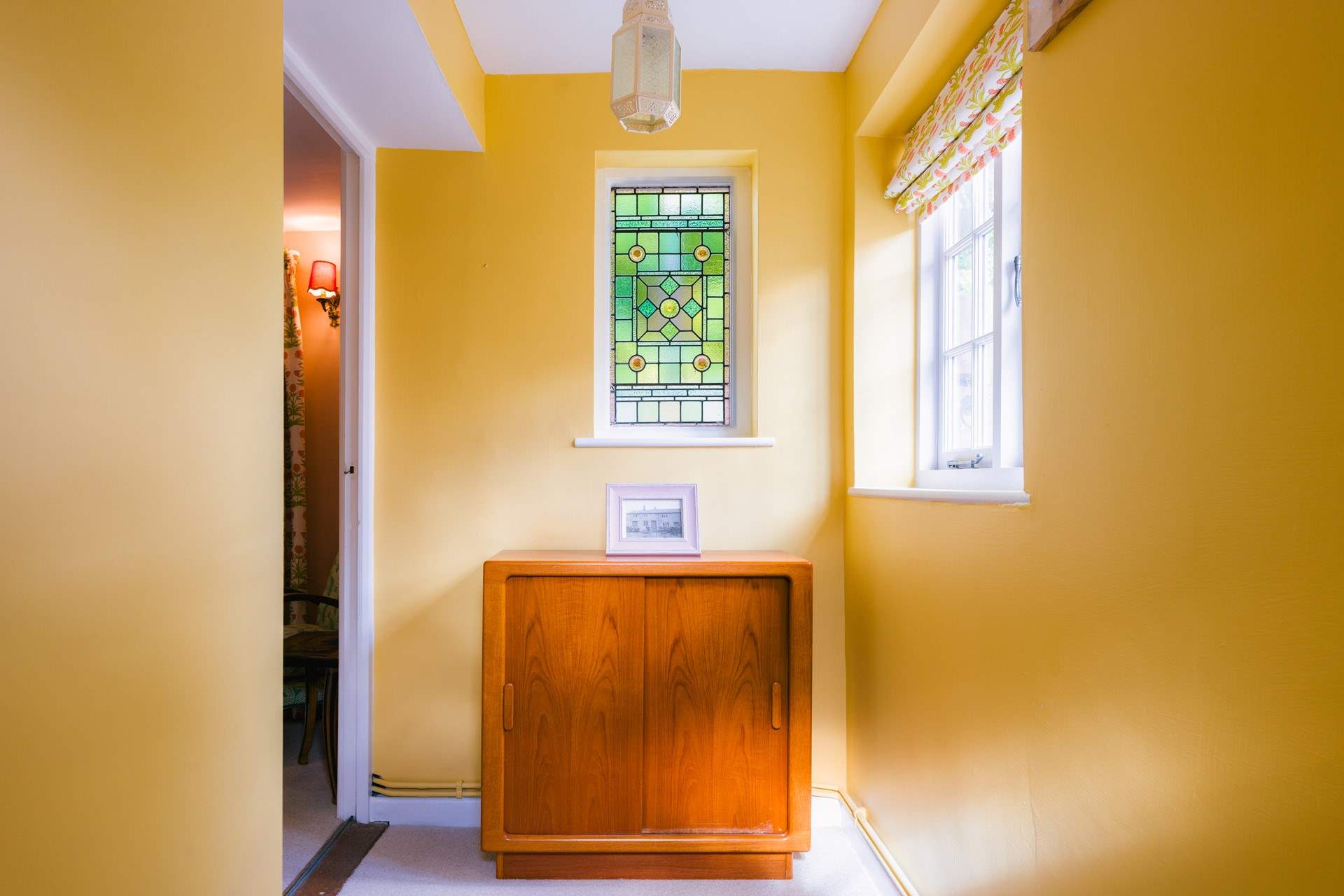 This stained glass window is another little design treat.
