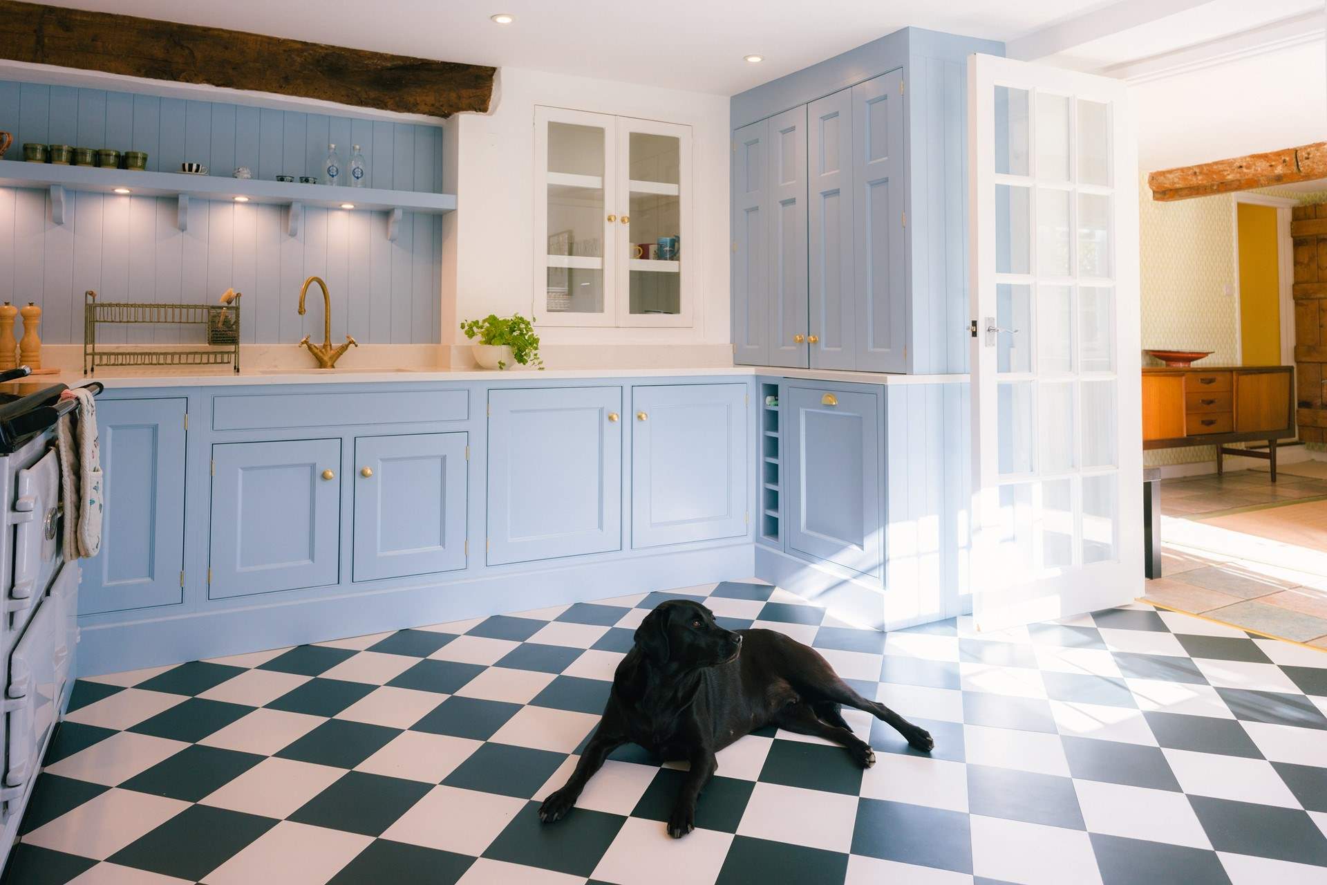 Plenty of countertops, storage and full of all the expected appliances. Plus a sunny spot for your four-legged friends.