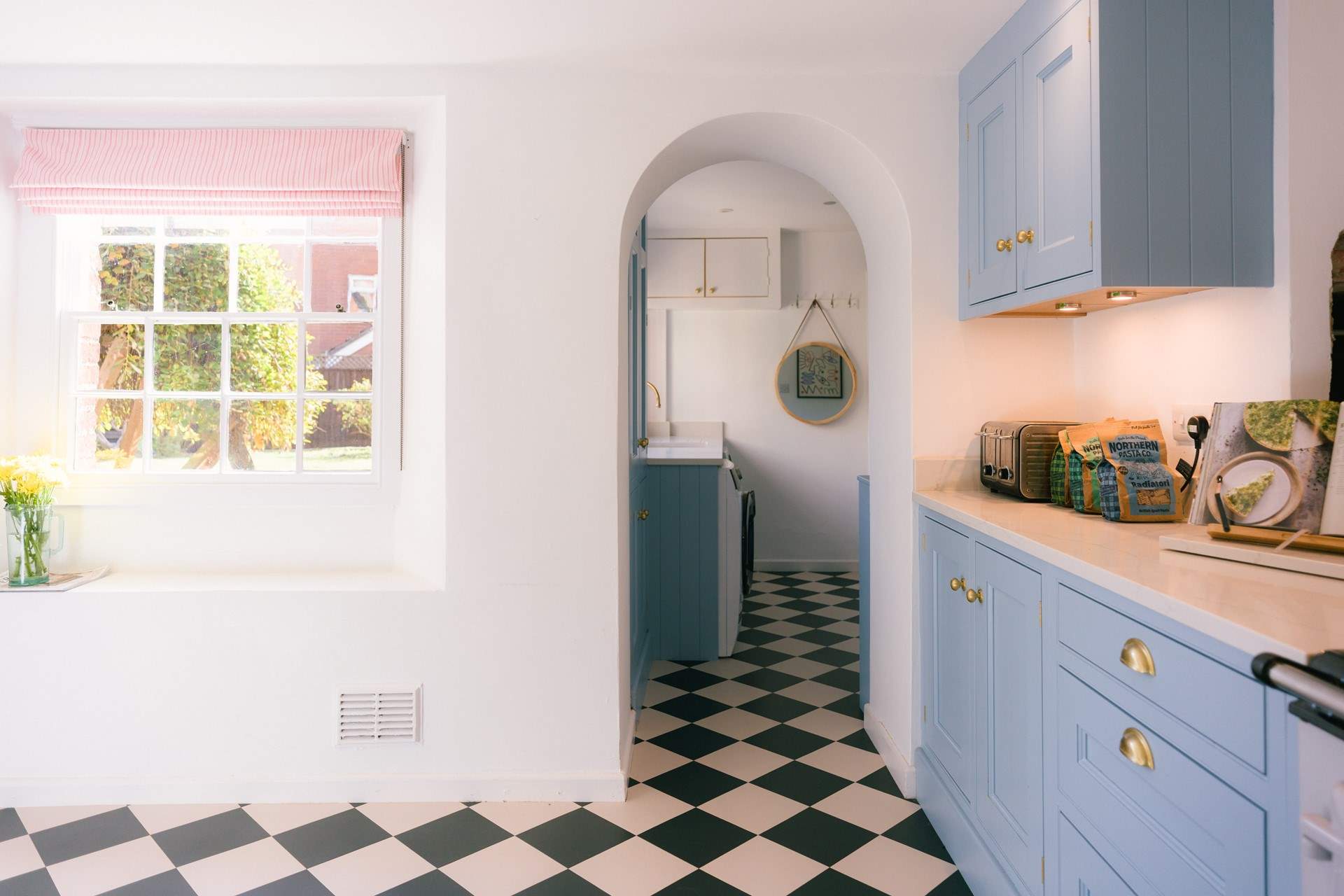 Leading directly off the kitchen is the utility-room.
