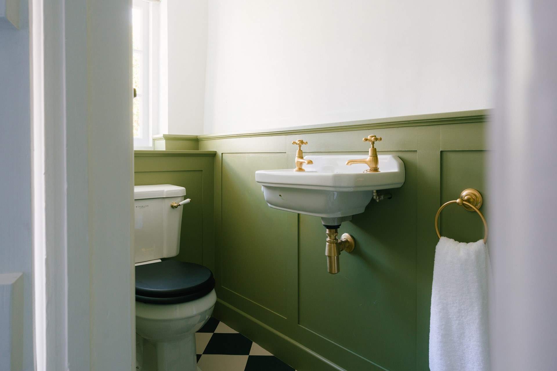 Even the cloakroom has had a stylish touch...