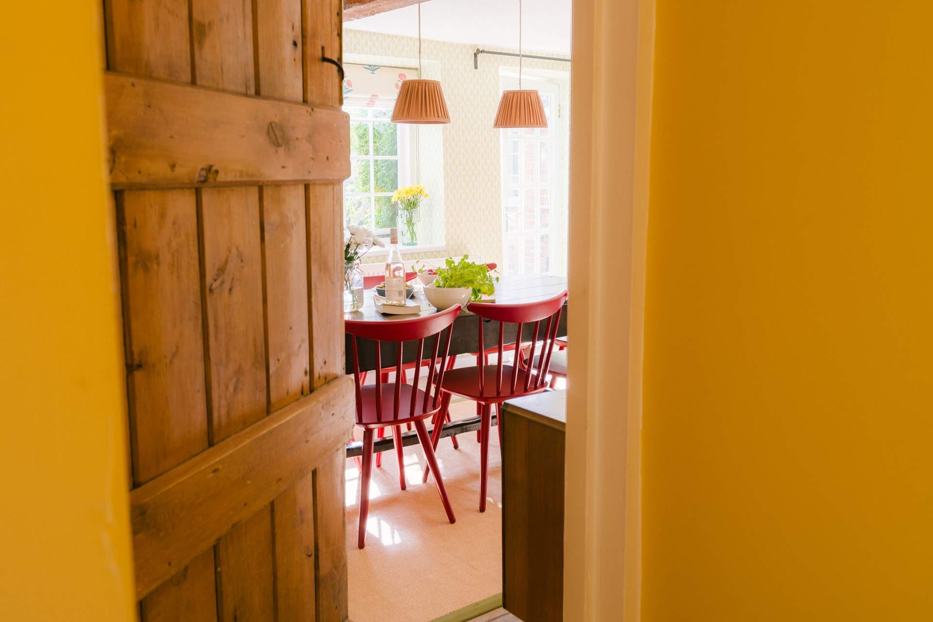 Back downstairs you pass through the dining-room and into the garden...