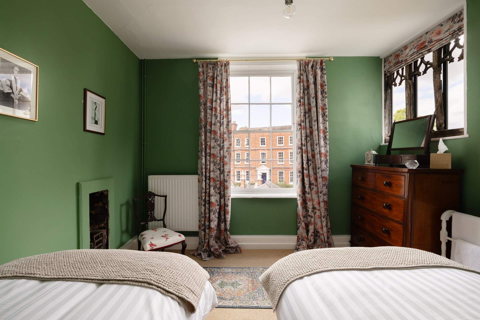 The first floor bedroom is a twin with views of the Dean's house and the courtyard. 