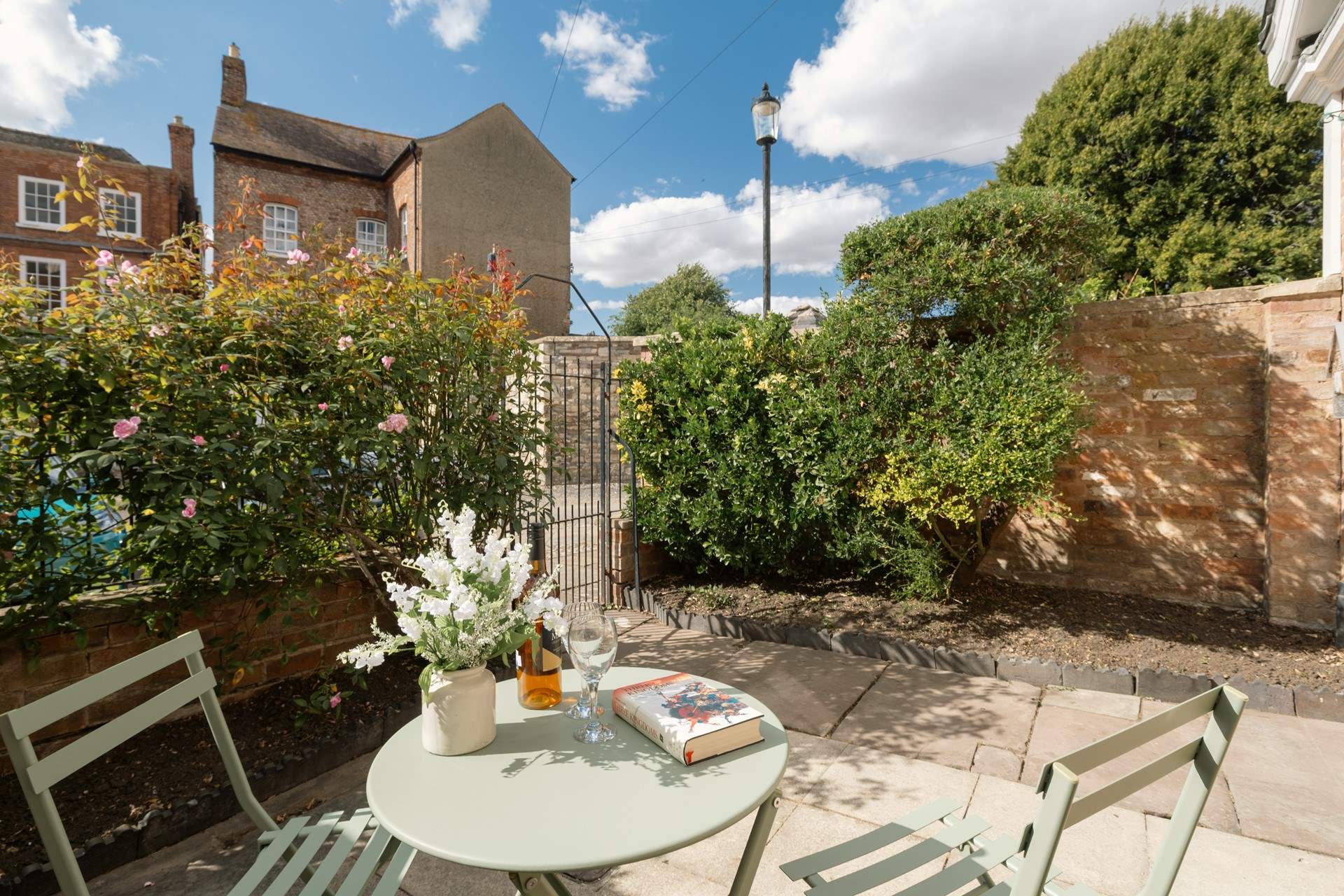 The walled courtyard is a little sun-trap.