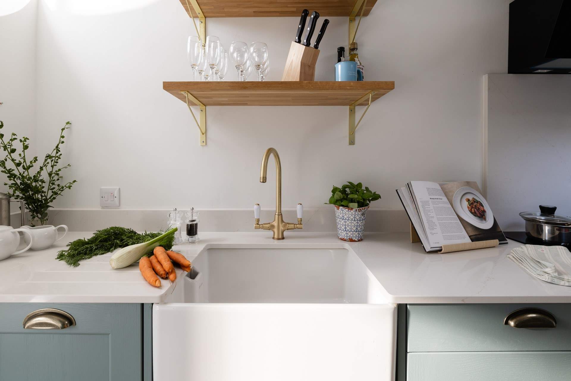 The large butler's sink is stylish and  perfectly in keeping with the kitchen.