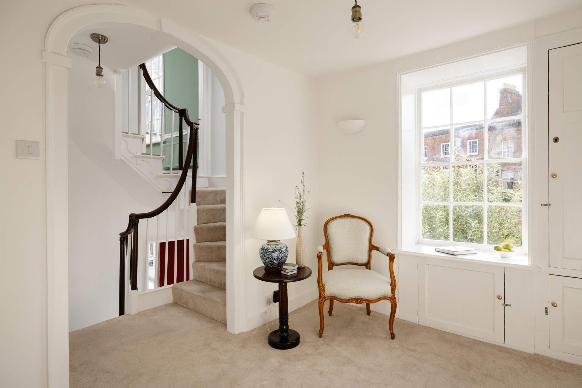 The first floor landing is large and has the original staircase.